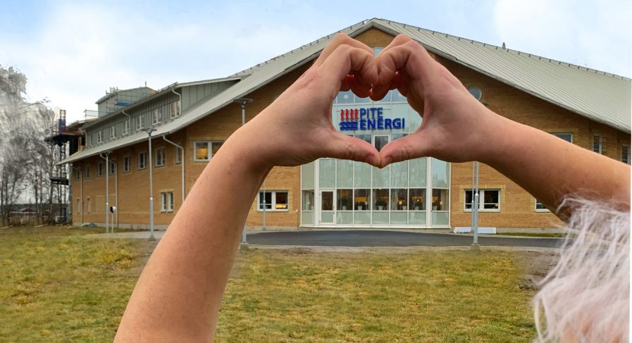 PiteEnergi huset med händer som formar ett hjärta
